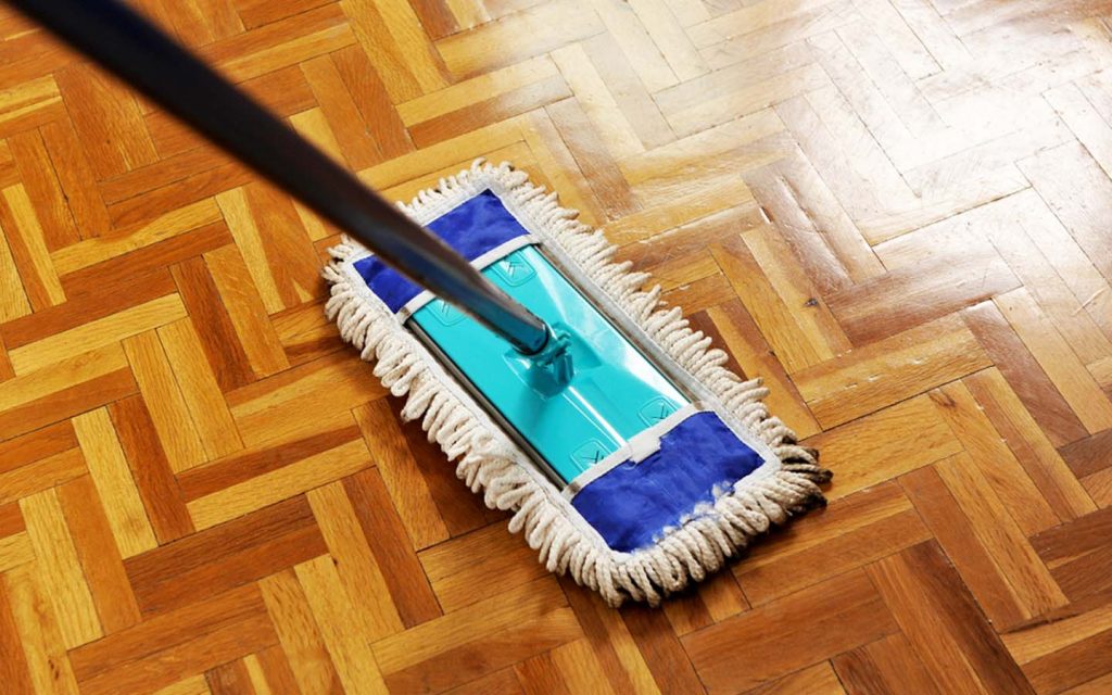 mopping parquet flooring